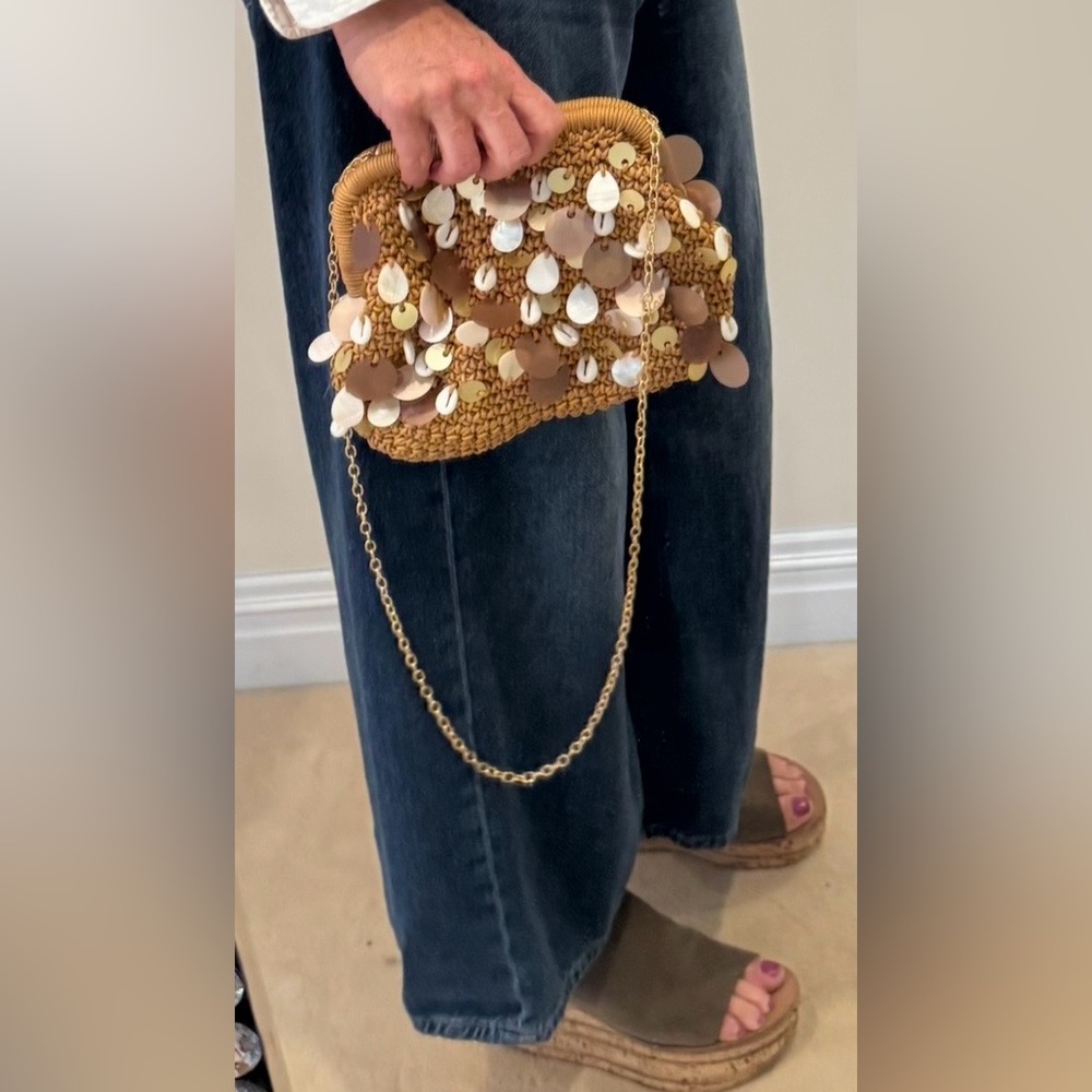 Brand new Hand woven texture soft gold and shell clutch